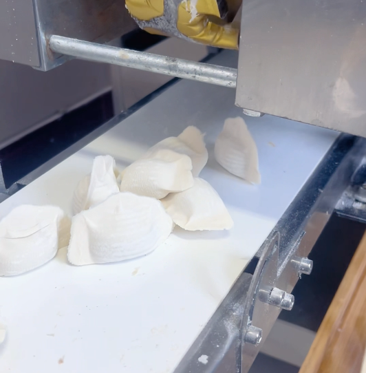 用餃子機(jī)包餃子和手工有什么區(qū)別